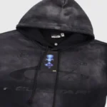A close-up view of the premium Hellstar Uniform black hoodie, showcasing its high-quality fleece and branded tag.