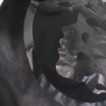 Close-up view of the screen-printed graphic details on the premium black fleece fabric of a Hellstar Uniform hoodie.