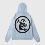 Back view of the premium Hellstar Uniform Hoodie in vibrant baby blue featuring a signature circular graphic logo.