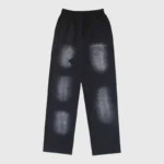 Hellstar Uniform Sweatpant black fleece featuring washed bleach patch details, elastic drawstring waist and side pockets