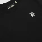 Premium Hellstar black unisex T-shirt featuring the brand's iconic logo and a stylish celestial flame graphic print.