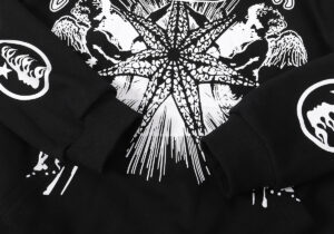 Close-up view of the black Hellstar Victory Capsule 6 hoodie featuring a prominent white star graphic print.