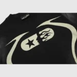 Black Hellstar Warm Up T-Shirt featuring a vintage washed cotton fabric with a unique white screen printed graphic.