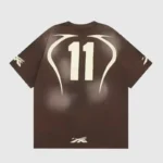 Hellstar brown warm-up t-shirt back view with cream number 11 and curved tribal-style graphic, 100% cotton vintage wash