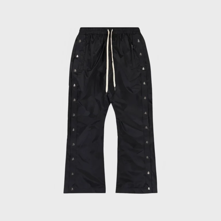 Hellstar black waxed nylon sweatpants with drawstring waist, featuring technical streetwear design and side detailing.