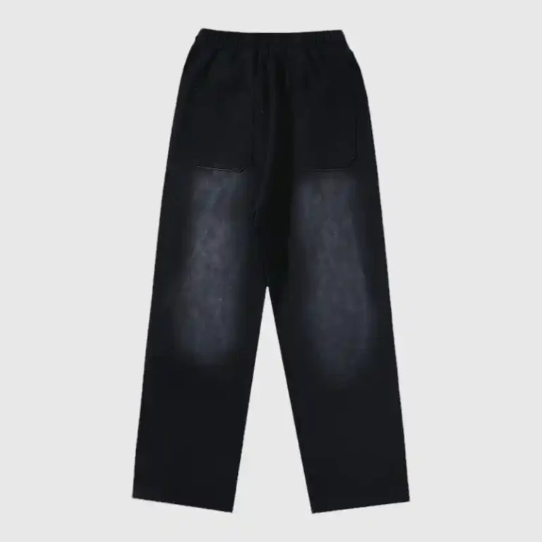 Back view of the Hellstar Waxed Sweatpant in black, featuring a faded waxed finish and pockets on a plain background.