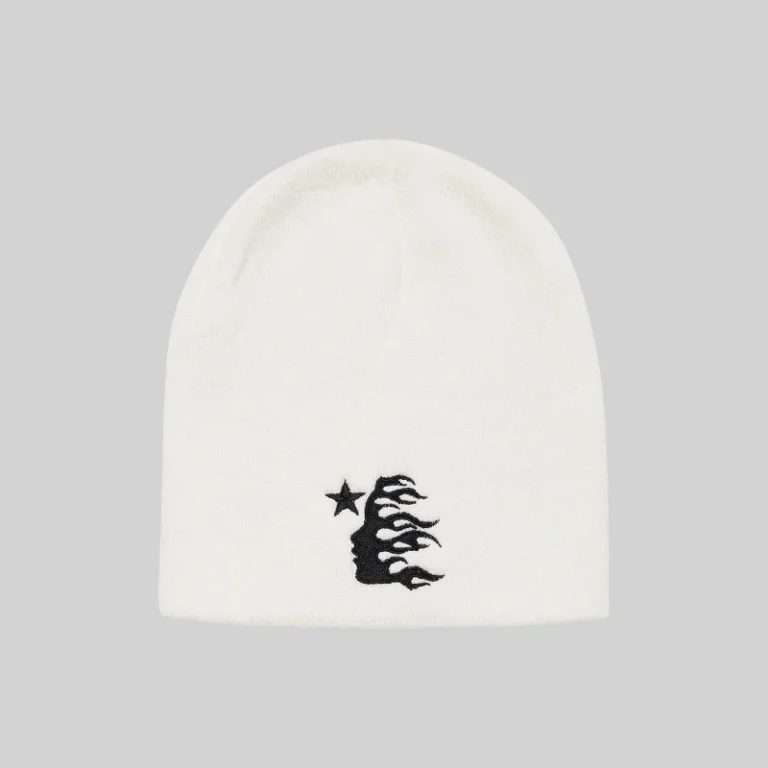 A soft white knit Hellstar beanie featuring a minimalist black embroidered graphic on the front for streetwear style.