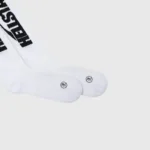 Hellstar White Classic Socks flat lay showing ribbed crew length, black Hellstar logo knit and cushioned sole