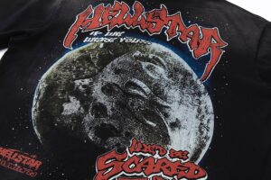 Hellstar Wolf T-Shirt featuring a vintage washed black fabric with a detailed moon and horror graphic design element.