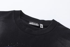 Close-up view of the Hellstar Wolf T-Shirt neck label on the black premium cotton vintage washed graphic garment.