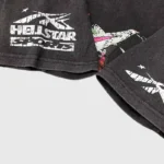Close-up graphic detail of the black Hellstar Worldwide Flight T-shirt featuring premium screen-printed street design.