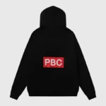 Back view of the black Hellstar x ComplexCon exclusive hoodie featuring a prominent red PBC box logo graphic.