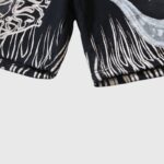 Close-up of the black and white graphic design and detailed hem of Hellstar Yoga Shorts athletic streetwear.