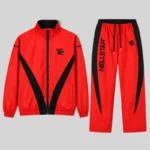 Hellstar Thriller red tracksuit featuring a zip-up jacket and matching pants with black accents and branded details.